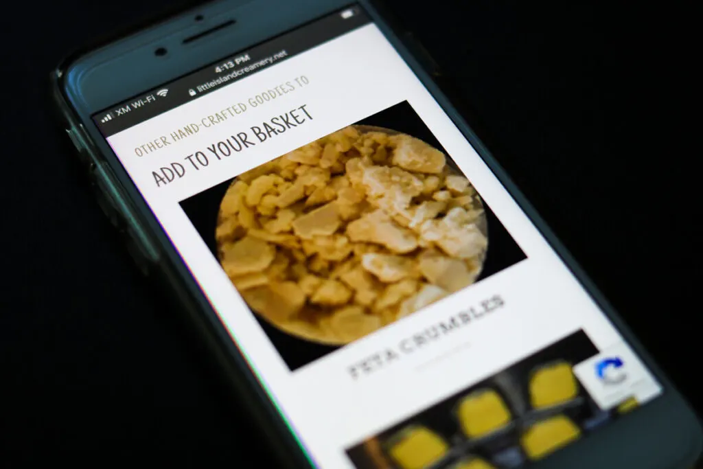 Phone showing ecommerce website