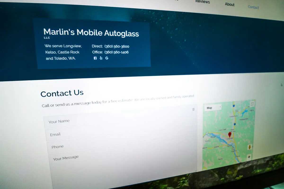 contact page of website on a computer monitor